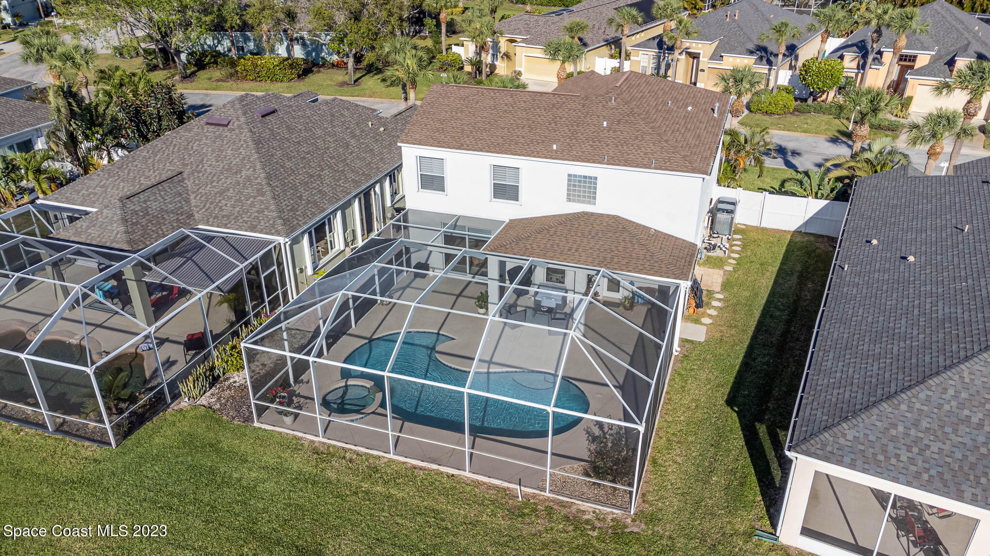 3032 Jacobaeus Lane Indialantic, FL 32903 - Photo 43 of 43 an aerial view of a house with a yard