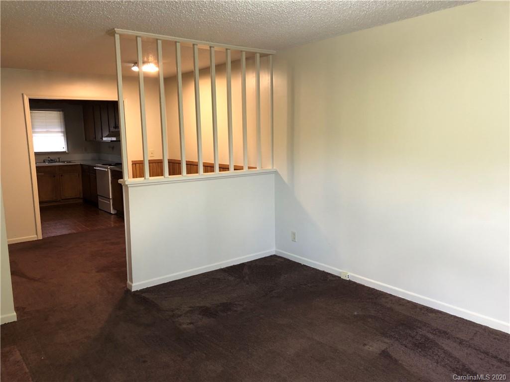 121 Massapoag Road Lincolnton, NC 28092 - Photo 2 of 6 an empty room with windows