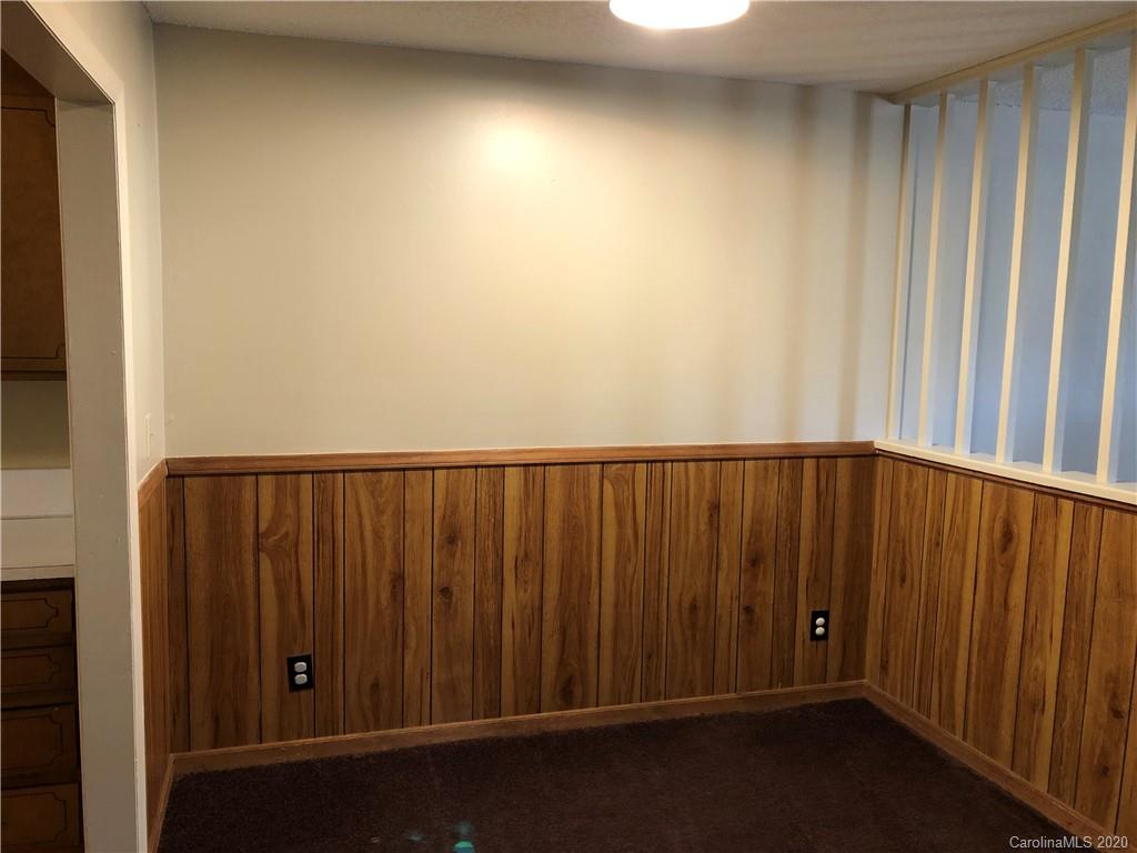 121 Massapoag Road Lincolnton, NC 28092 - Photo 4 of 6 a view of a wooden wall