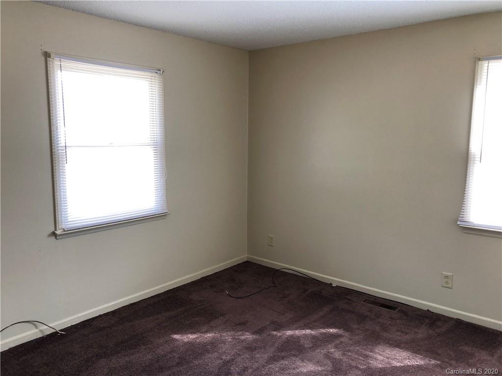 121 Massapoag Road Lincolnton, NC 28092 - Photo 5 of 6 an empty room with a window