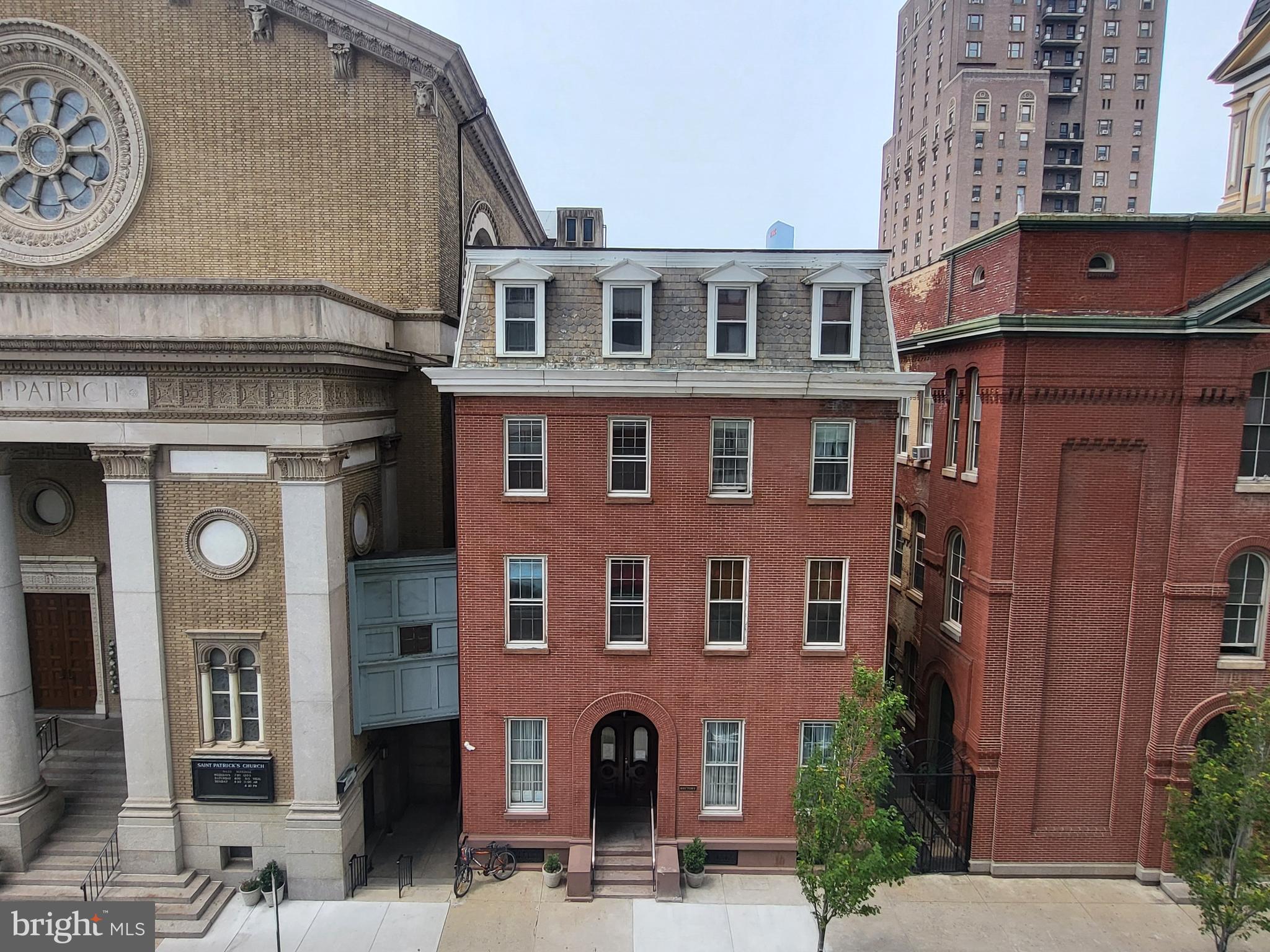 224 West Rittenhouse Square, Unit 413 Philadelphia, PA 19103 - Photo 17 of 25 a front view of a building with a outdoor space
