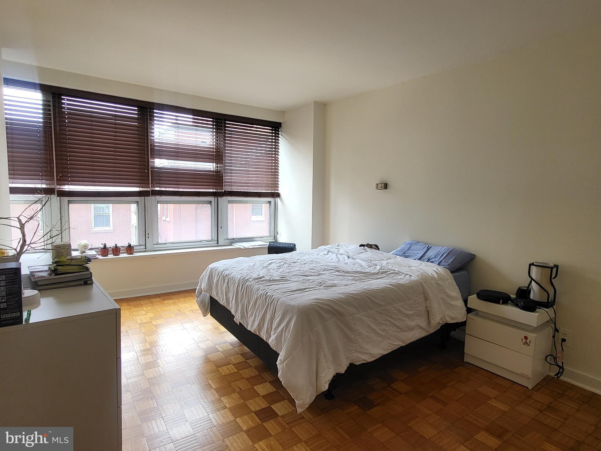 224 West Rittenhouse Square, Unit 413 Philadelphia, PA 19103 - Photo 8 of 25 a bedroom with a bed and a window