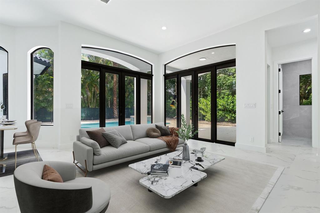 17935 Monte Vista Drive Boca Raton, FL 33496 - Photo 23 of 60 a living room with furniture and a large window
