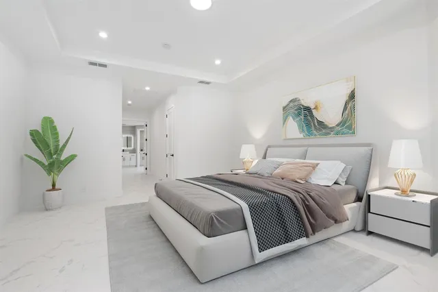 a bathroom with a toilet a sink and a window