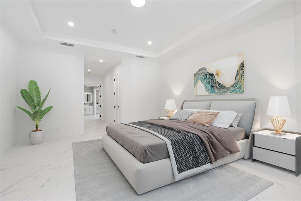 17935 Monte Vista Drive Boca Raton, FL 33496 - Photo 29 of 60 a bedroom with a bed and a chandelier