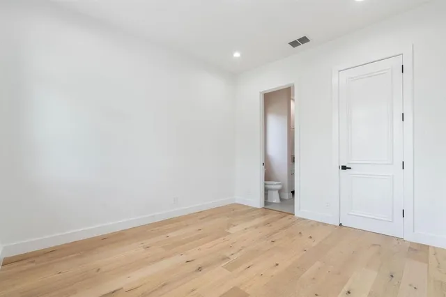 a bathroom with a mirror and a shower