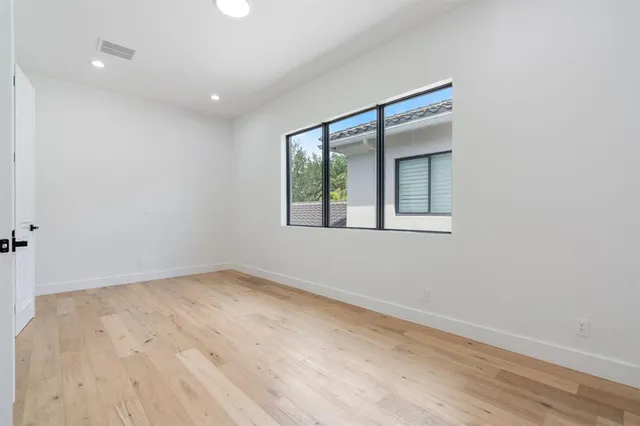a outdoor space with patio the couches and a potted plant on the table