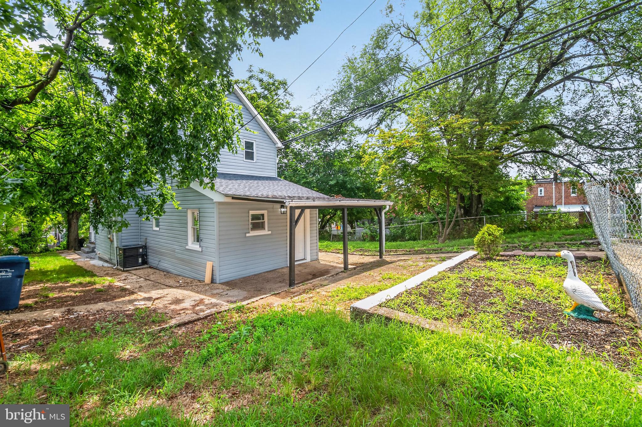 3708 7th Street Baltimore, MD 21225 - Photo 2 of 8 Charming backyard retreat awaits you!