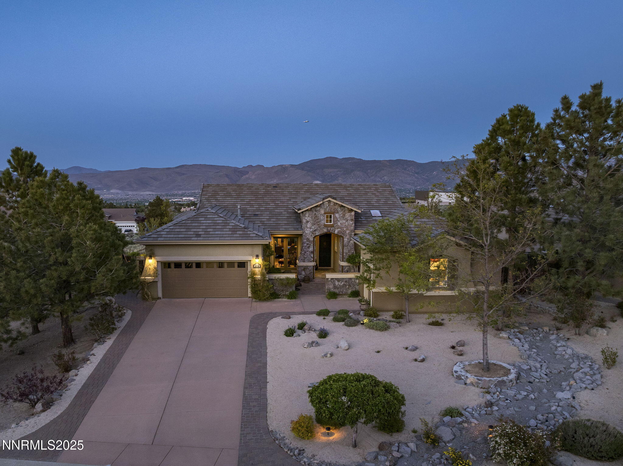 2698 Wind Feather Trail Reno, NV 89511 - Photo 27 of 44 a view of a house with a yard and a large tree