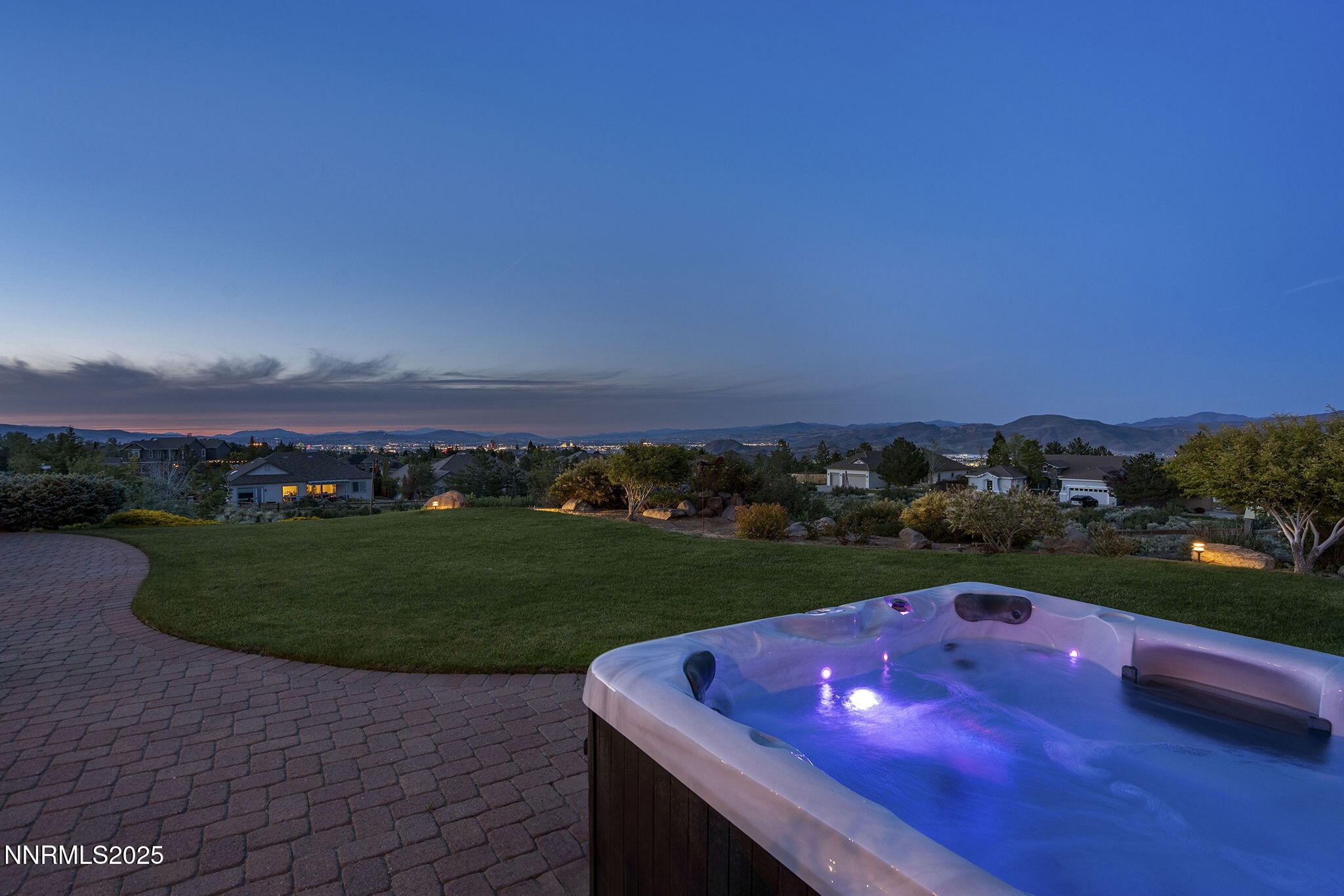 2698 Wind Feather Trail Reno, NV 89511 - Photo 29 of 44 a view of a big yard with potted plants and wooden fence