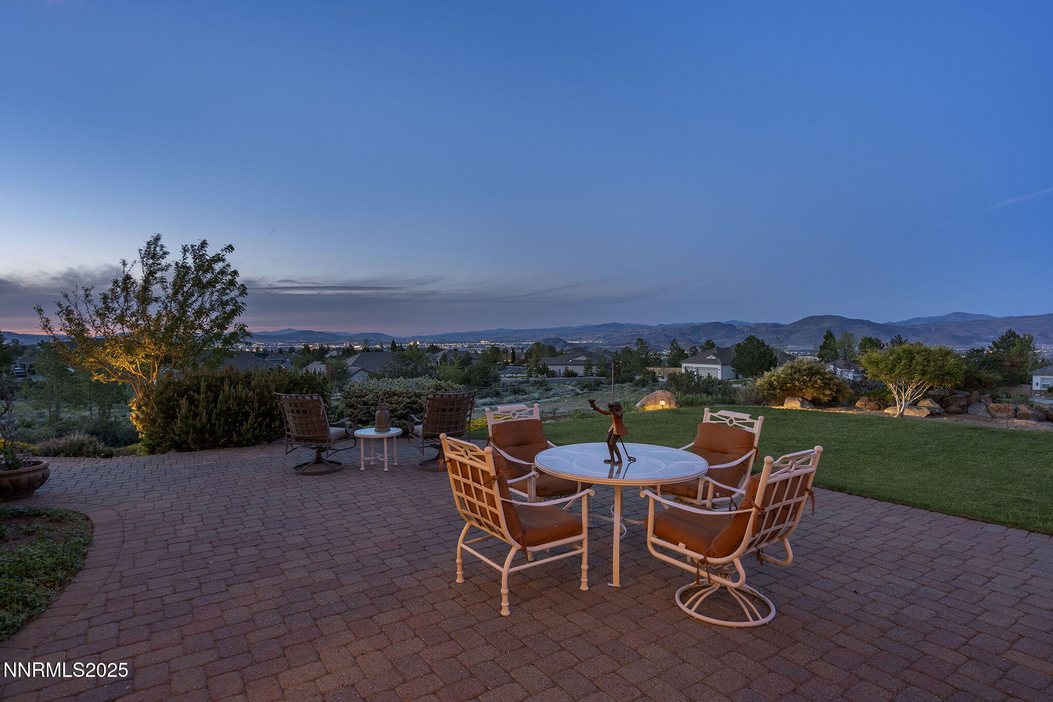 2698 Wind Feather Trail Reno, NV 89511 - Photo 30 of 44 a view of a patio with a table and chairs