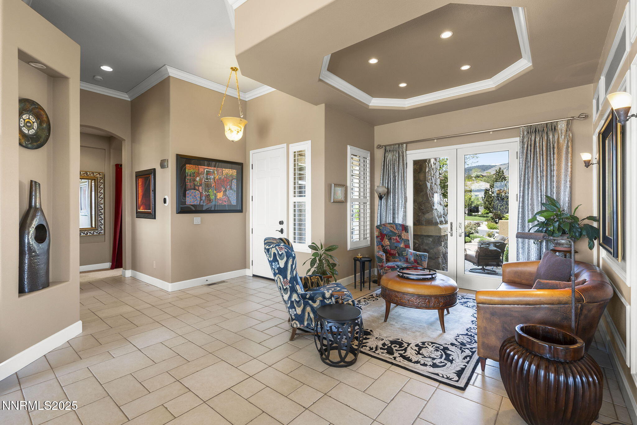 2698 Wind Feather Trail Reno, NV 89511 - Photo 4 of 44 a living room with furniture and a table