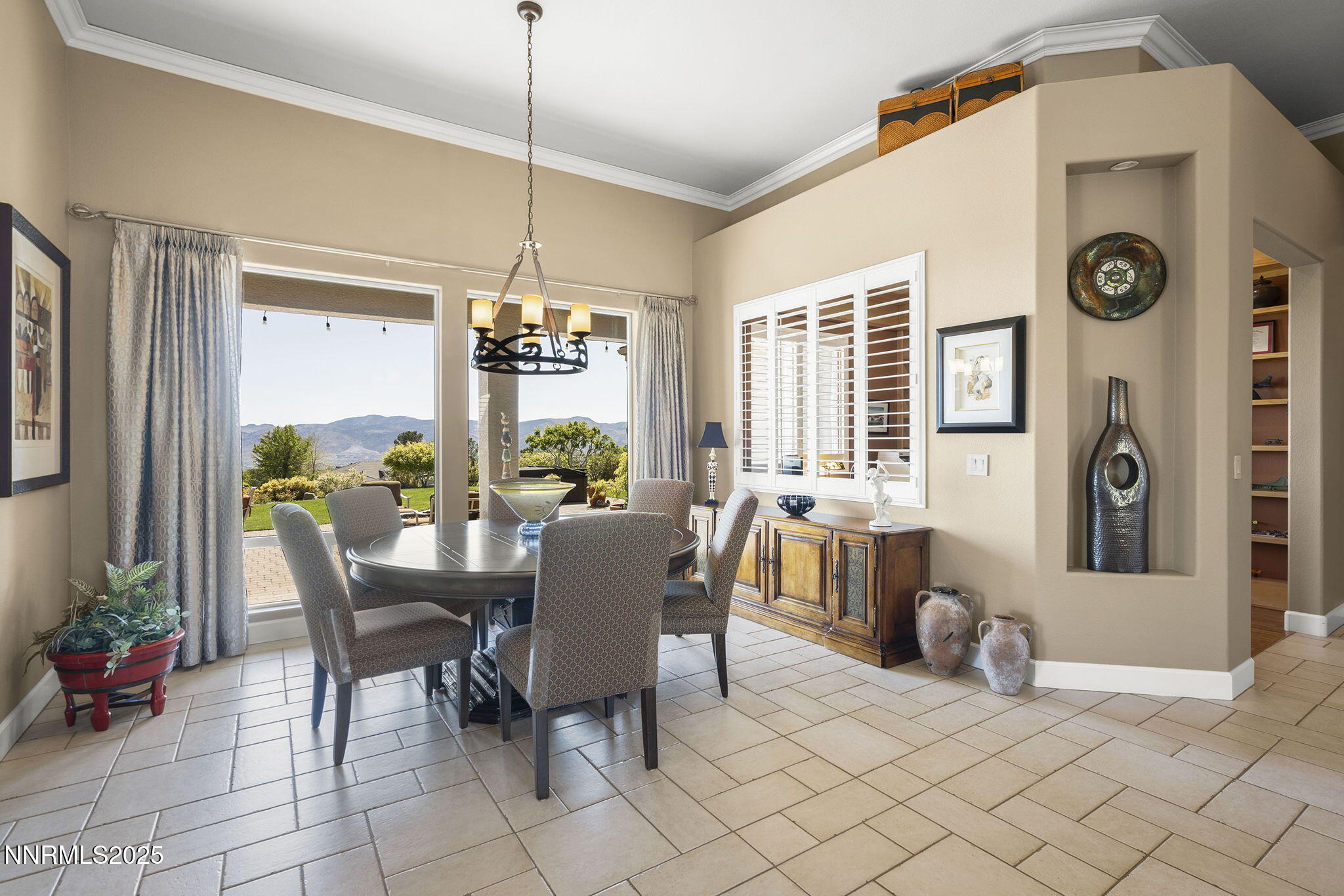 2698 Wind Feather Trail Reno, NV 89511 - Photo 5 of 44 a view of a dining room with furniture window and outside view