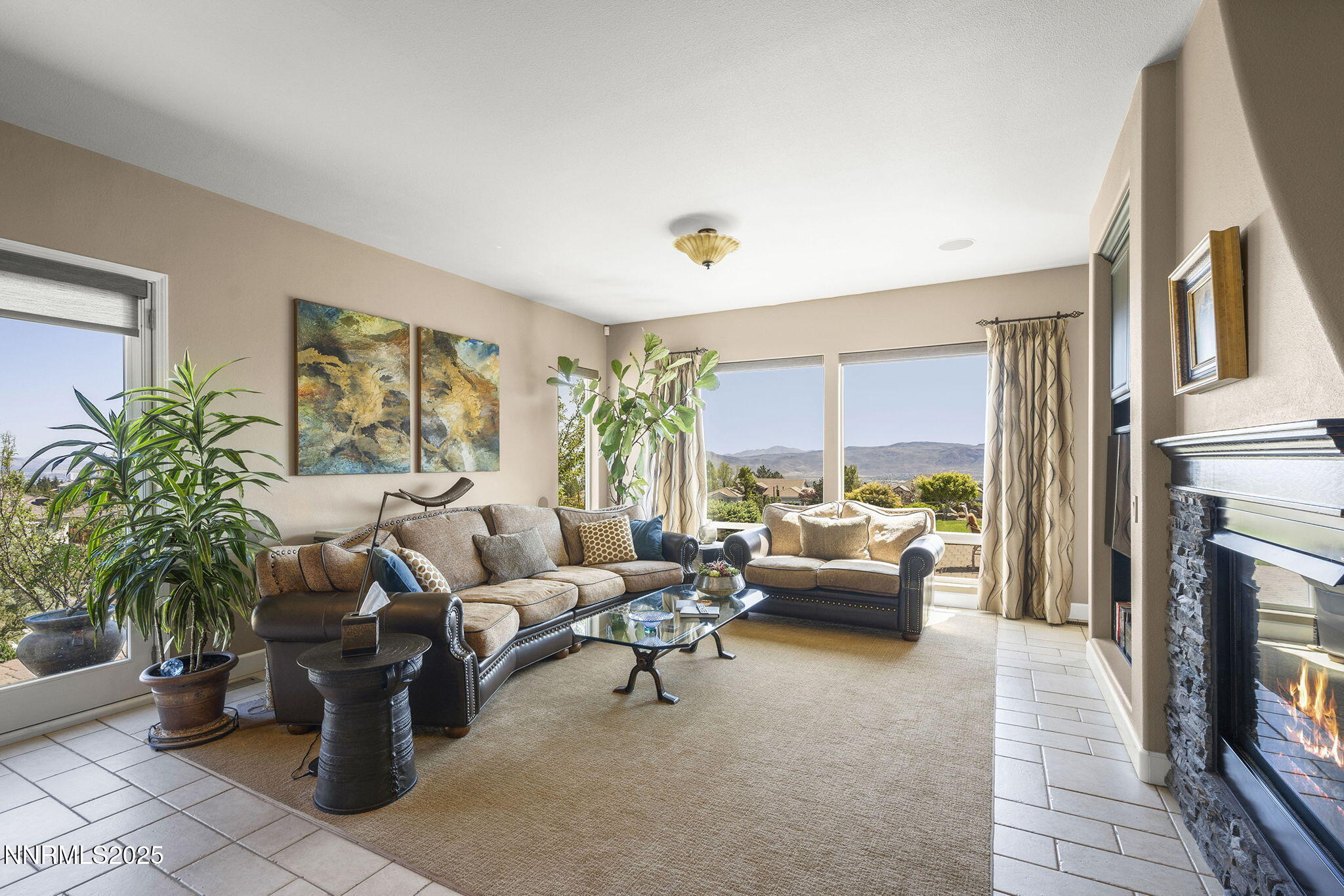2698 Wind Feather Trail Reno, NV 89511 - Photo 7 of 44 a living room with furniture and a fireplace