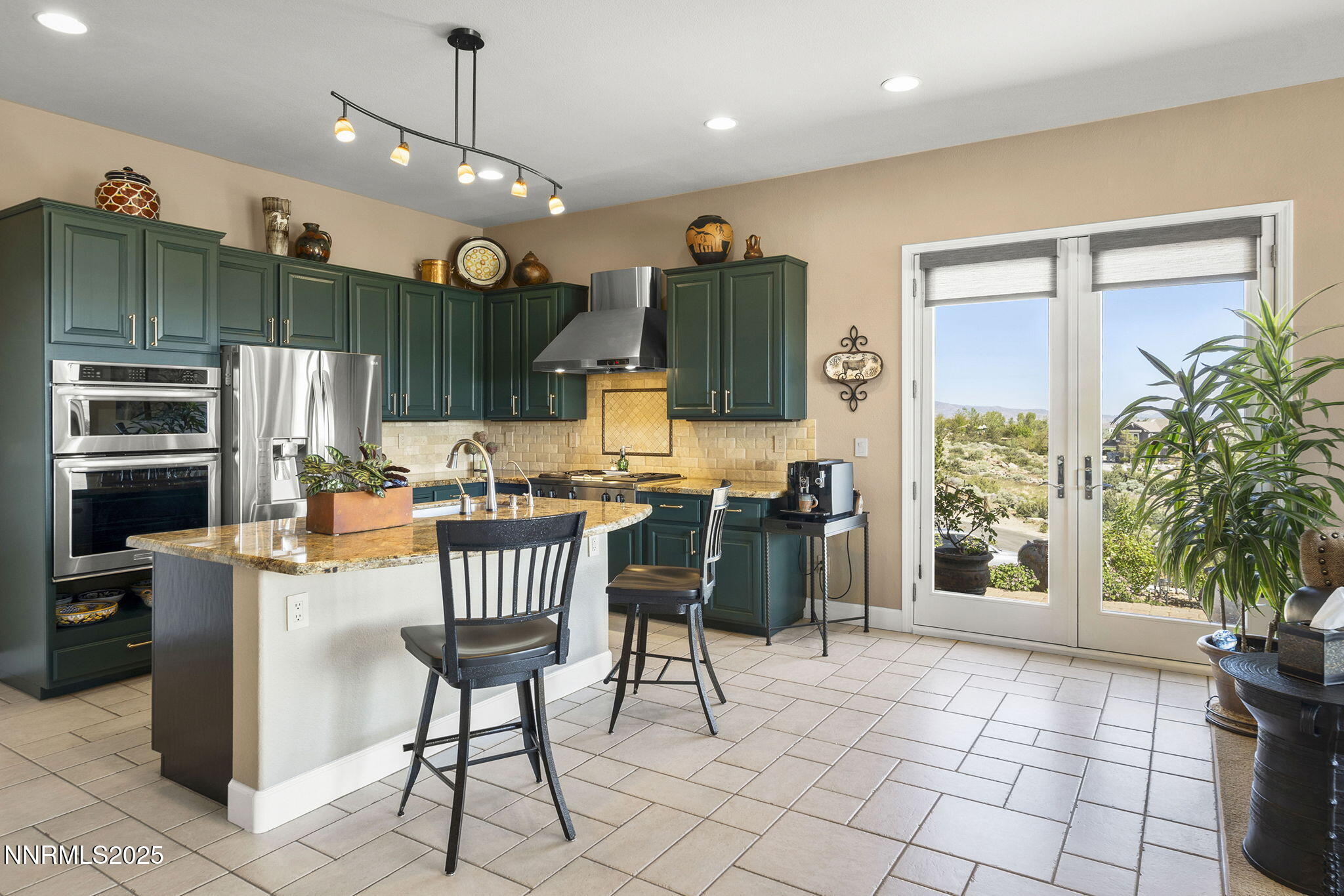 2698 Wind Feather Trail Reno, NV 89511 - Photo 10 of 44 a view of a livingroom with furniture and a kitchen