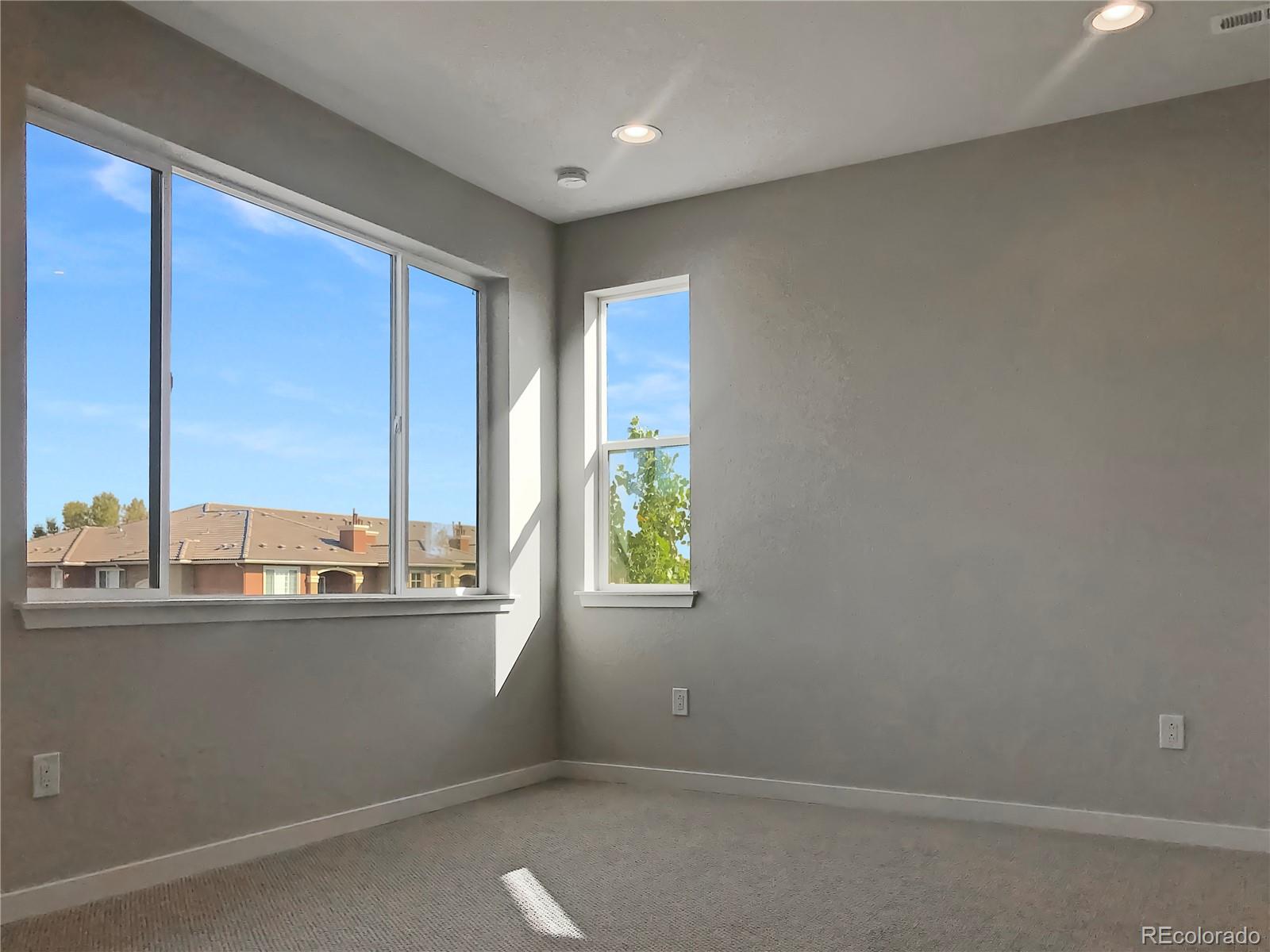 6767 South Tempe Court Aurora, CO 80016 - Photo 18 of 25 a view of an empty room with a window