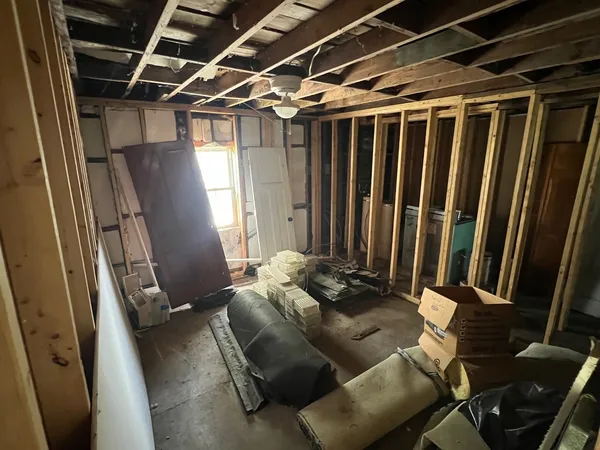 a room with furniture and a window