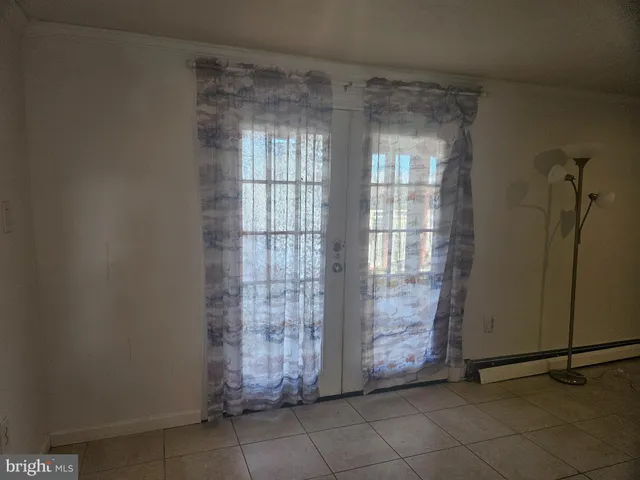 a view of an empty room with window