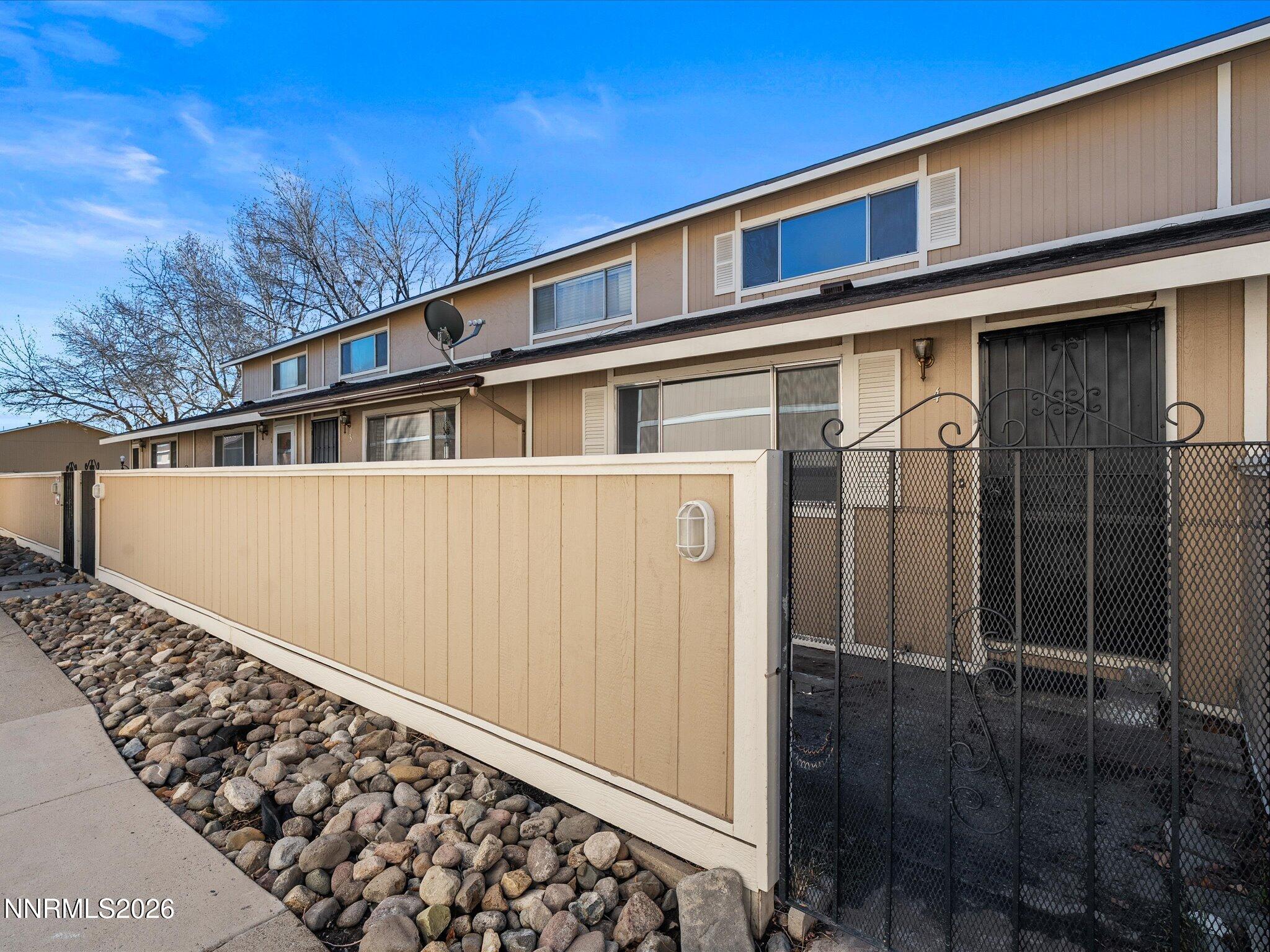 220 Allouette Way, Unit 4 Carson City, NV 89701 - Photo 1 of 22 a view of a house with a large window