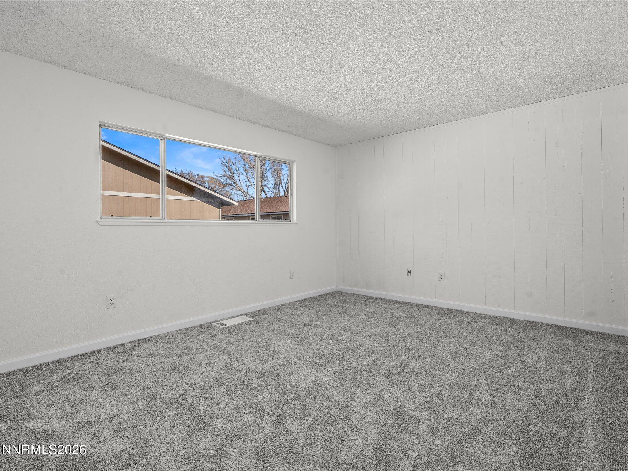 220 Allouette Way, Unit 4 Carson City, NV 89701 - Photo 13 of 22 a view of an empty room