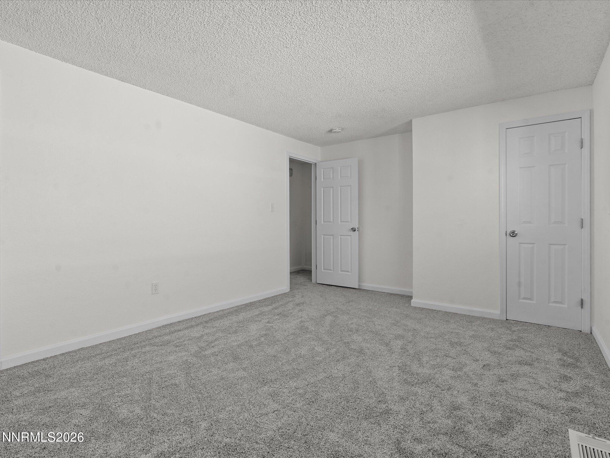220 Allouette Way, Unit 4 Carson City, NV 89701 - Photo 14 of 22 a view of an empty room