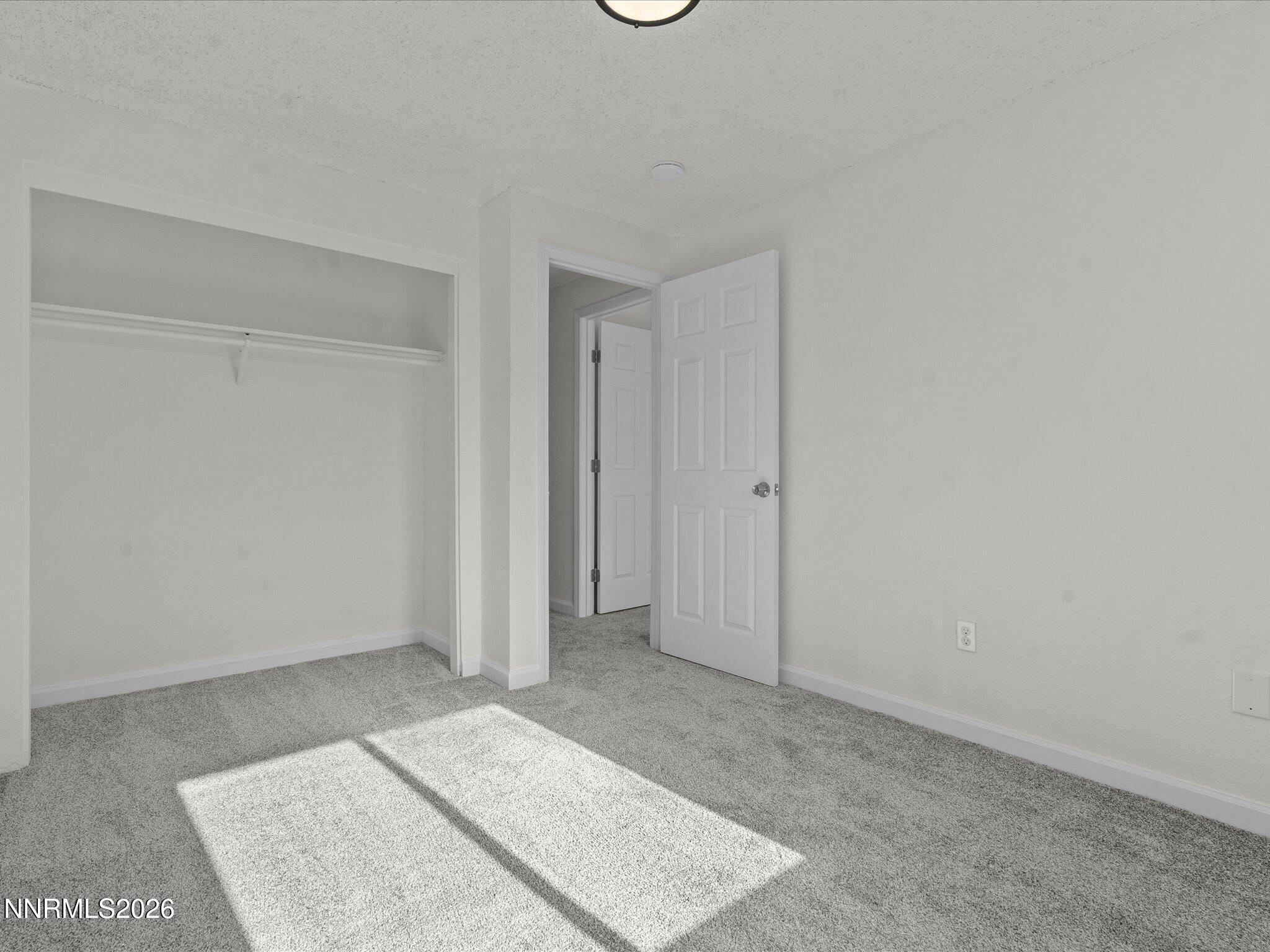 220 Allouette Way, Unit 4 Carson City, NV 89701 - Photo 19 of 22 a view of an empty room