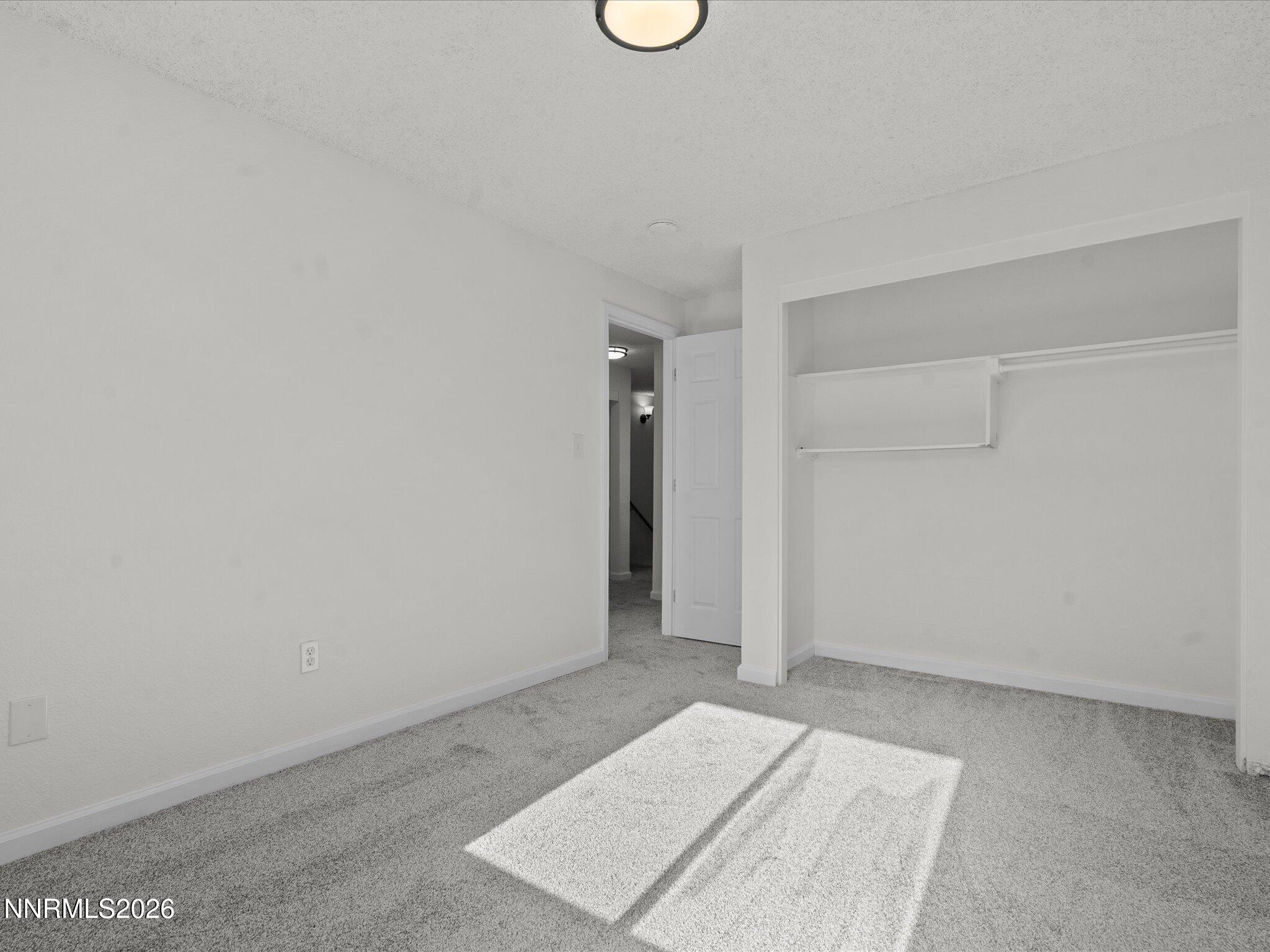 220 Allouette Way, Unit 4 Carson City, NV 89701 - Photo 21 of 22 an empty room with an entrance