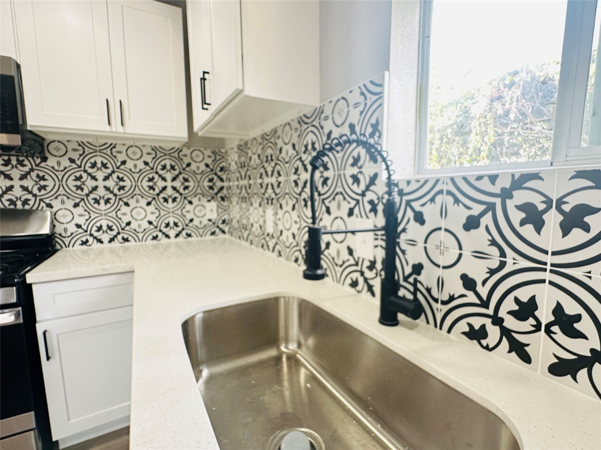 4018 Gano Street, Unit 2 Houston, TX 77009 - Photo 5 of 17 a view of a kitchen with a window