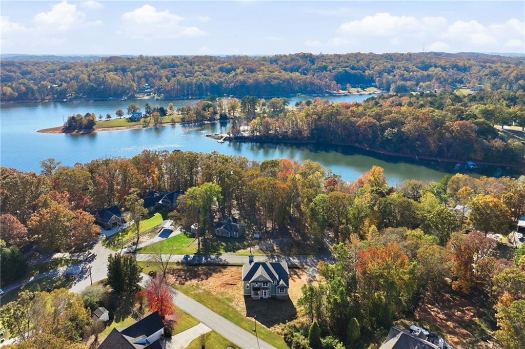 3613 Schofield Road Gainesville, GA 30506 - Photo 11 of 42 an aerial view of a houses with a lake view
