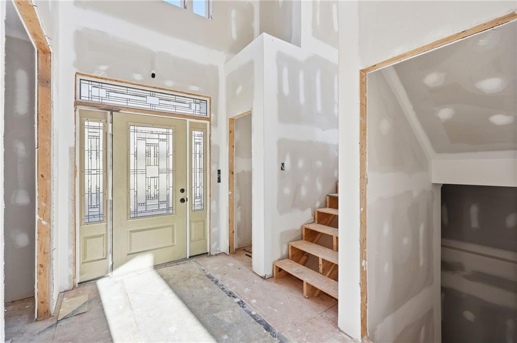 3613 Schofield Road Gainesville, GA 30506 - Photo 15 of 42 a view of an entryway with wooden floor and door