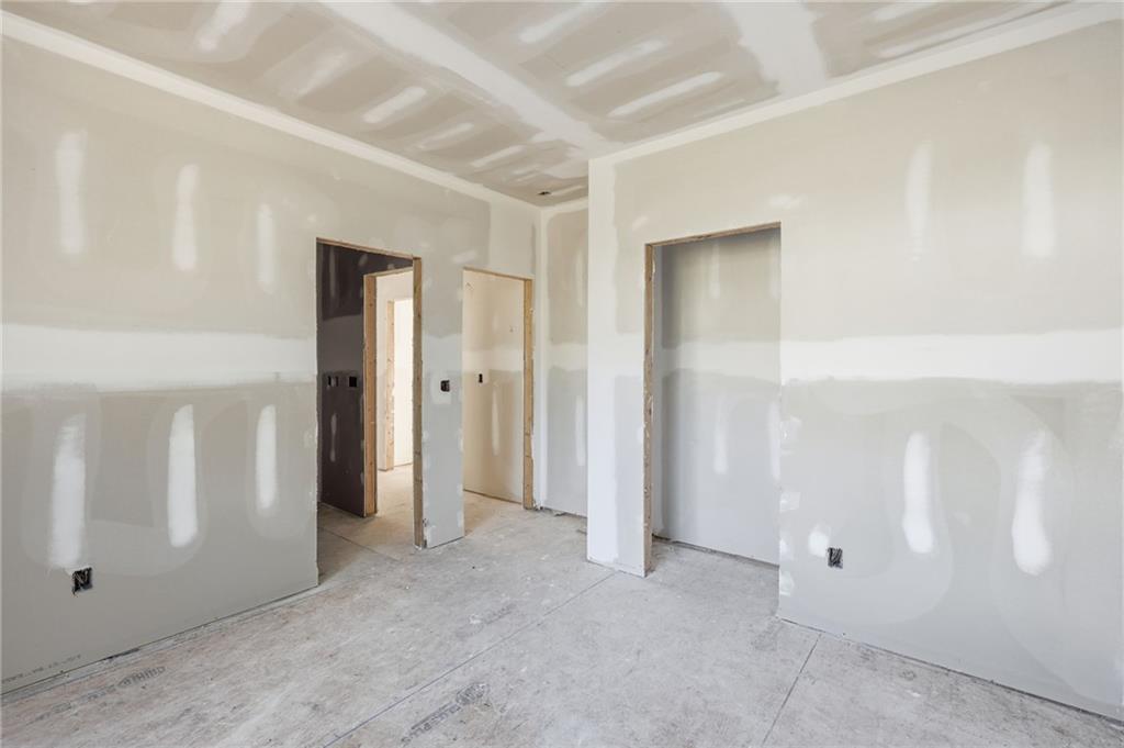 3613 Schofield Road Gainesville, GA 30506 - Photo 24 of 42 an empty room with windows