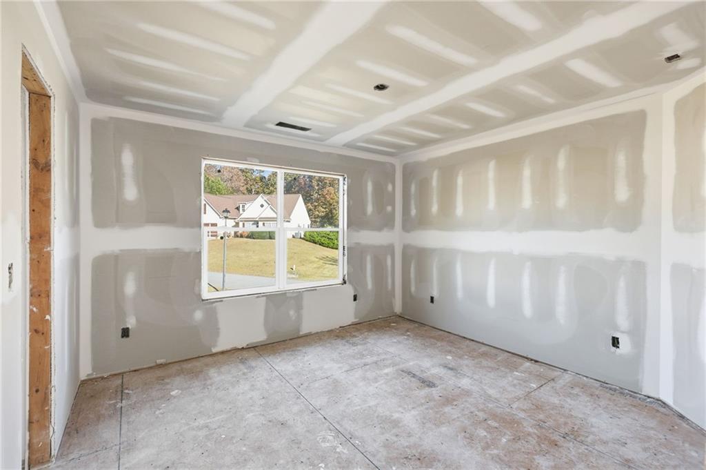 3613 Schofield Road Gainesville, GA 30506 - Photo 28 of 42 an empty room with windows