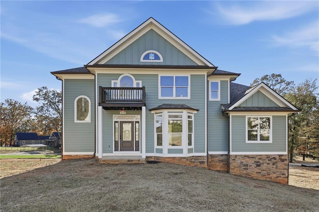 3613 Schofield Road Gainesville, GA 30506 - Photo 3 of 42 a front view of a house with a yard