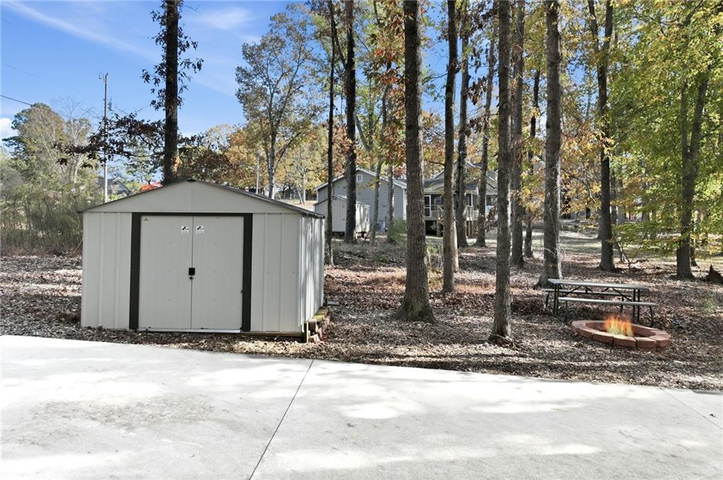 3613 Schofield Road Gainesville, GA 30506 - Photo 41 of 42 a front view of a house with trees