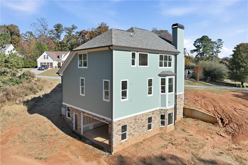 3613 Schofield Road Gainesville, GA 30506 - Photo 6 of 42 a front view of a house with mountain view