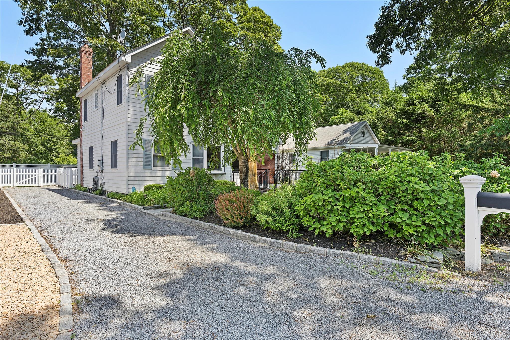 54 Breezy Point Road Wading River, NY 11792 - Photo 17 of 17 Long driveway for multiple cars
