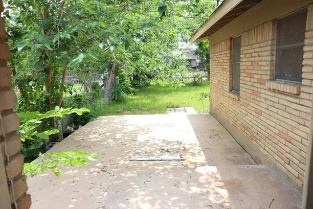 a view of backyard with hardwood