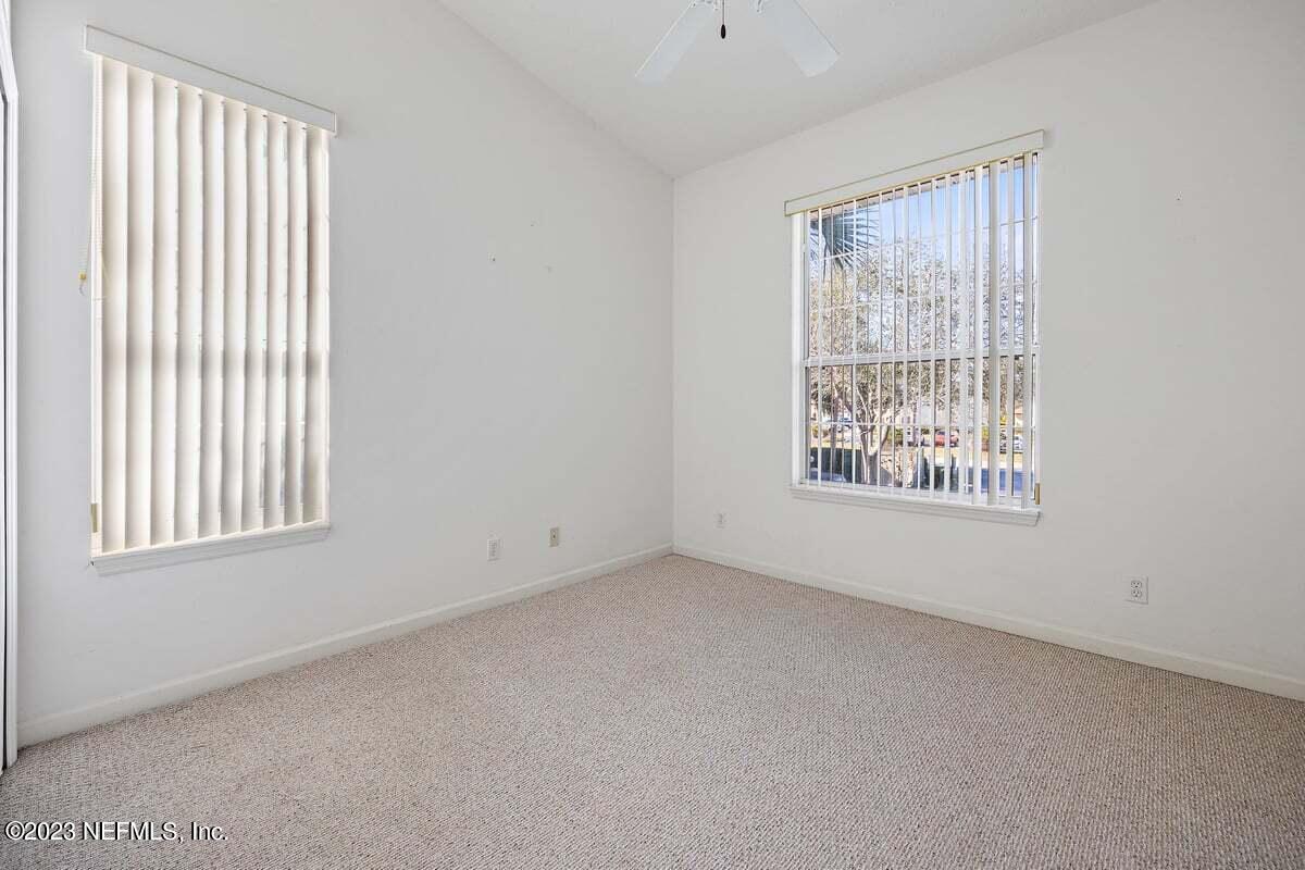 811 Pine Valley Place St. Augustine, FL 32086 - Photo 12 of 30 an empty room with windows