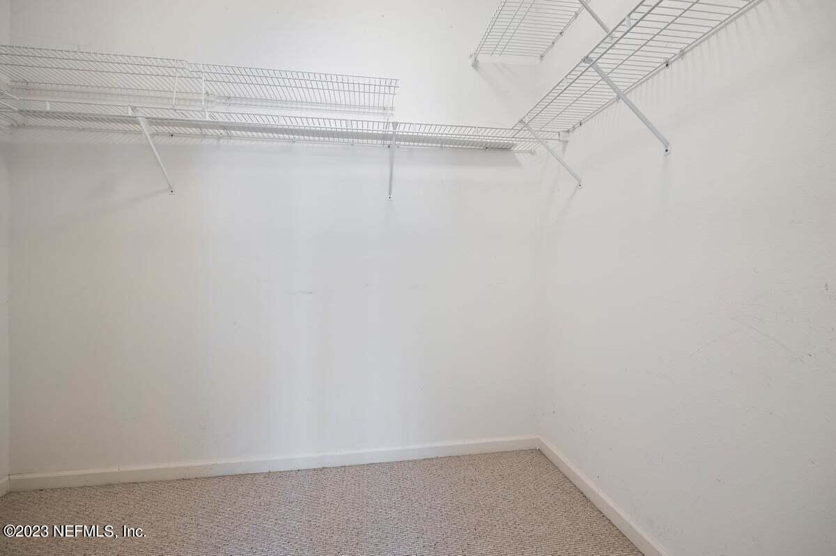 811 Pine Valley Place St. Augustine, FL 32086 - Photo 14 of 30 a view of a room with racks on the wall