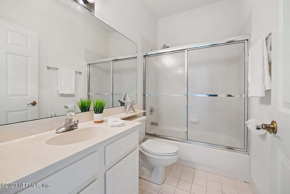 811 Pine Valley Place St. Augustine, FL 32086 - Photo 15 of 30 a bathroom with a sink toilet and shower