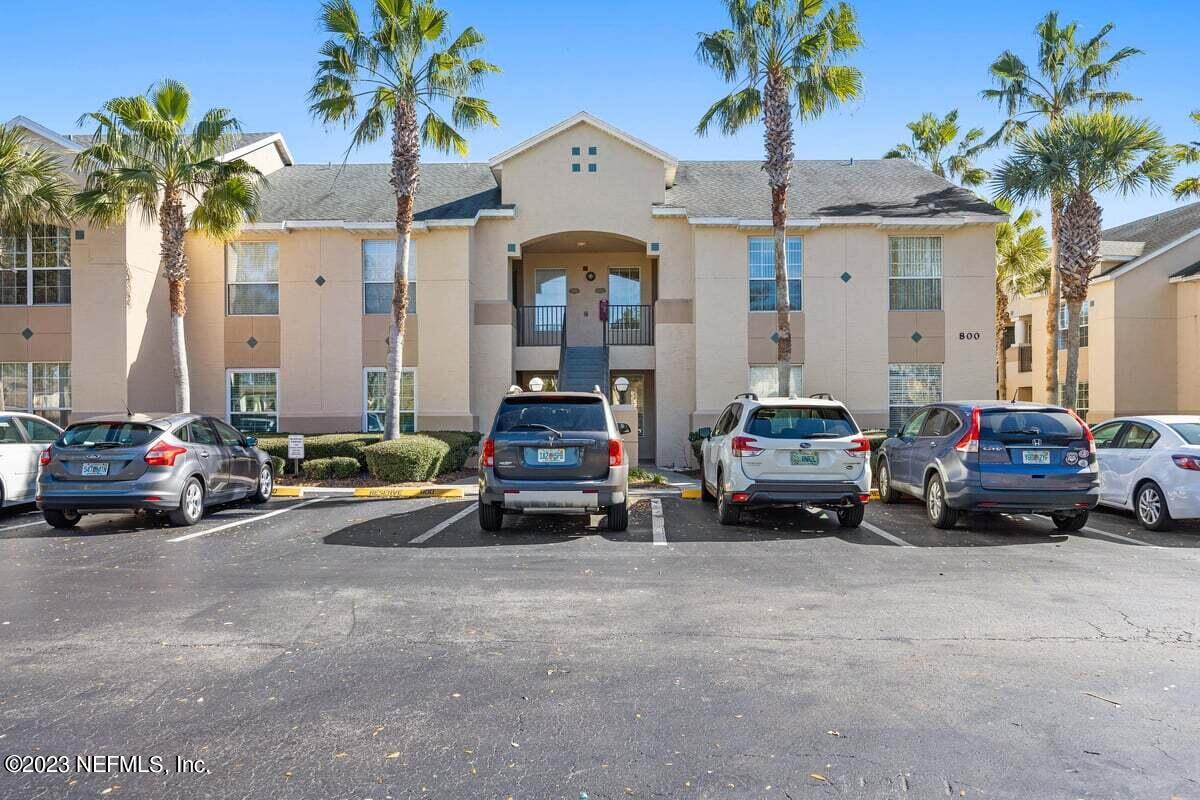 811 Pine Valley Place St. Augustine, FL 32086 - Photo 2 of 30 a cars parked in front of a house