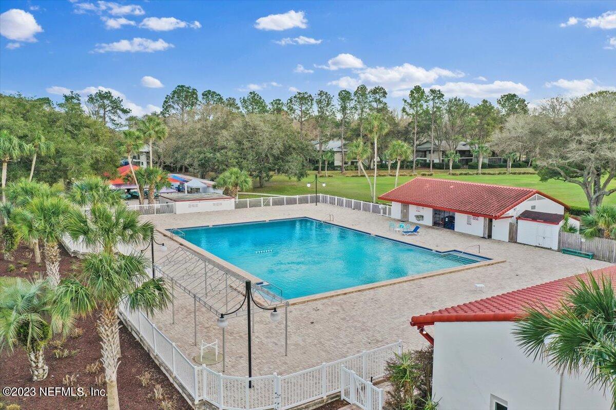 811 Pine Valley Place St. Augustine, FL 32086 - Photo 24 of 30 a view of a swimming pool with a patio