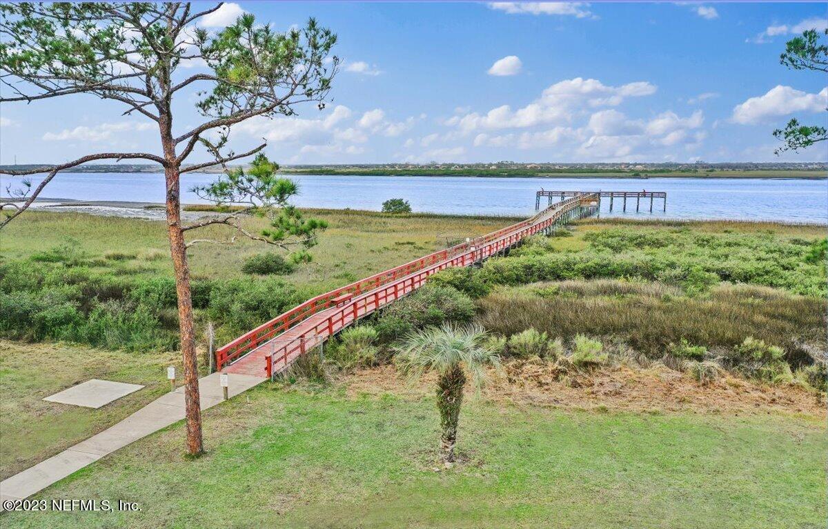 811 Pine Valley Place St. Augustine, FL 32086 - Photo 27 of 30 a view of a lake from a yard