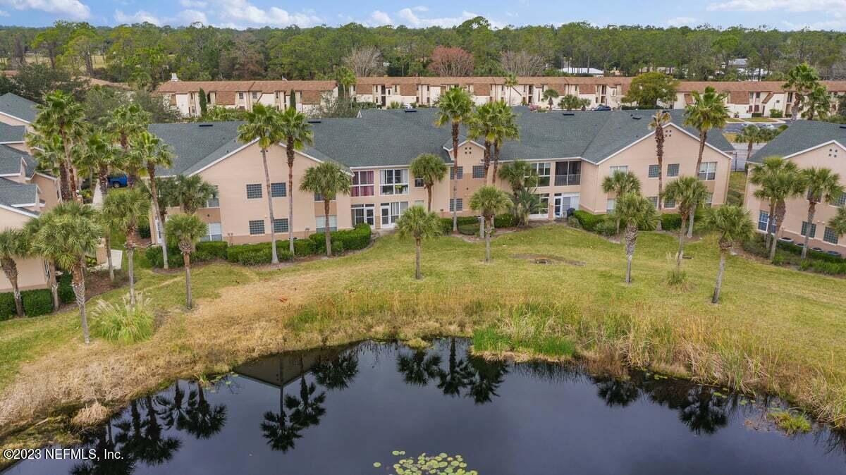 811 Pine Valley Place St. Augustine, FL 32086 - Photo 3 of 30 an aerial view of residential houses with outdoor space and trees