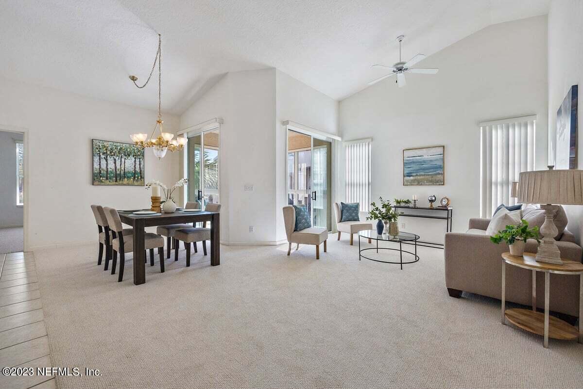 811 Pine Valley Place St. Augustine, FL 32086 - Photo 9 of 30 a view of a livingroom and dining room