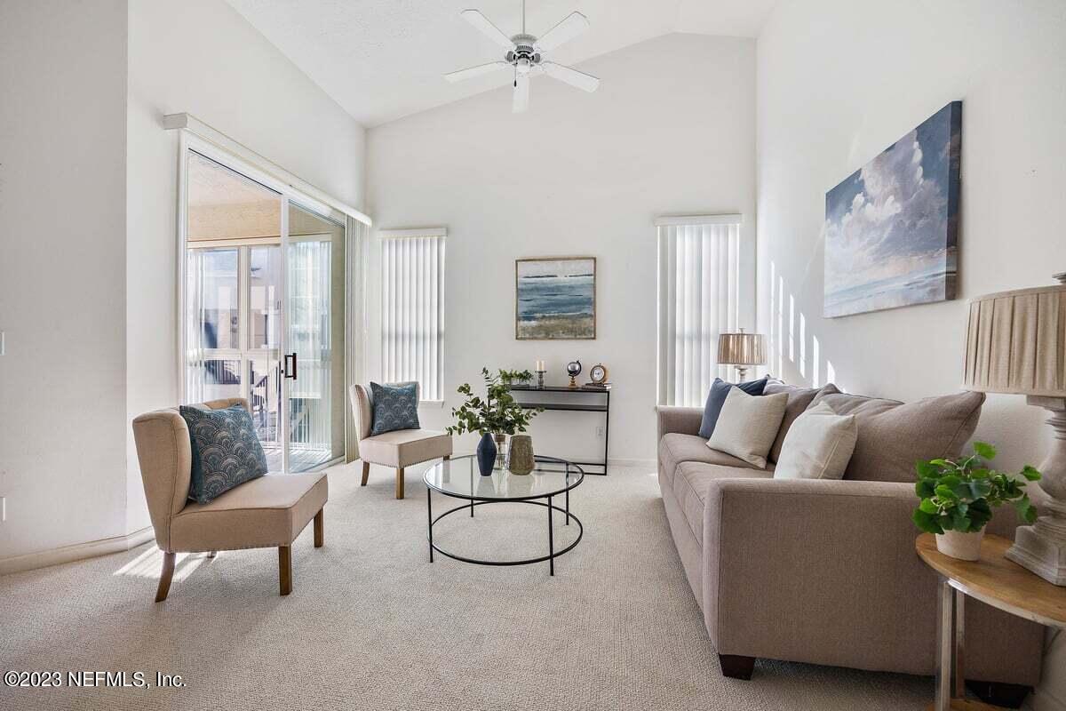 811 Pine Valley Place St. Augustine, FL 32086 - Photo 10 of 30 a living room with furniture and a large window