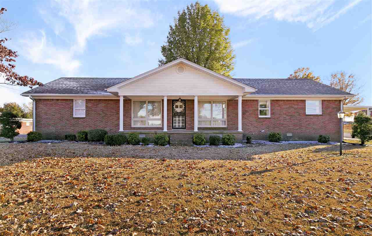 735 McKnight Street Rutherford, TN 38369 - Photo 1 of 1 a front view of a house with a yard