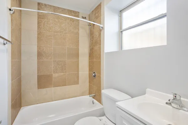 a bathroom with a sink and a bathtub