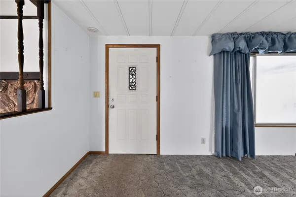 a view of a hallway with closet