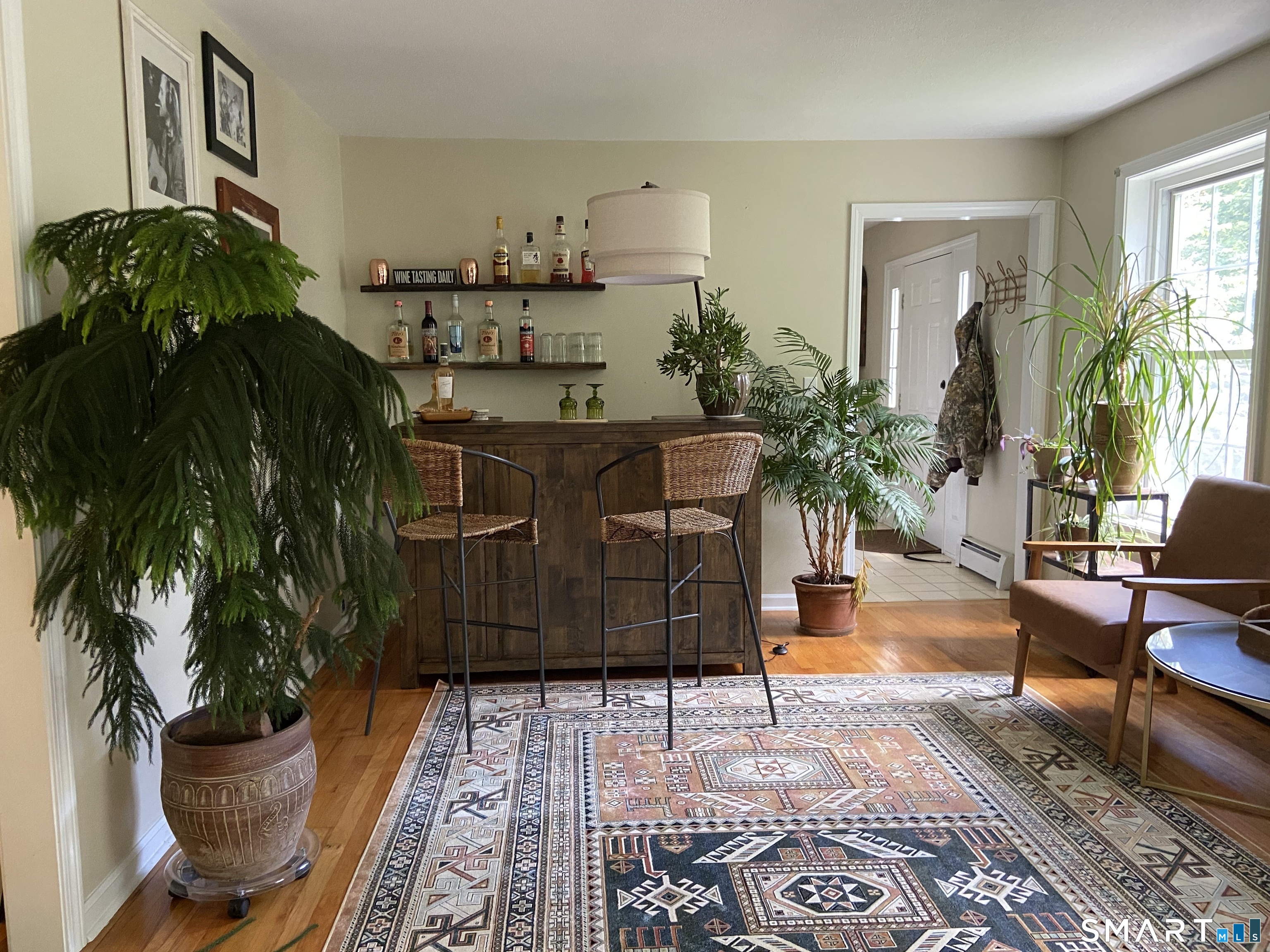 237 Chestnut Hill Road Killingworth, CT 06419 - Photo 14 of 39 a living room with furniture and a potted plant